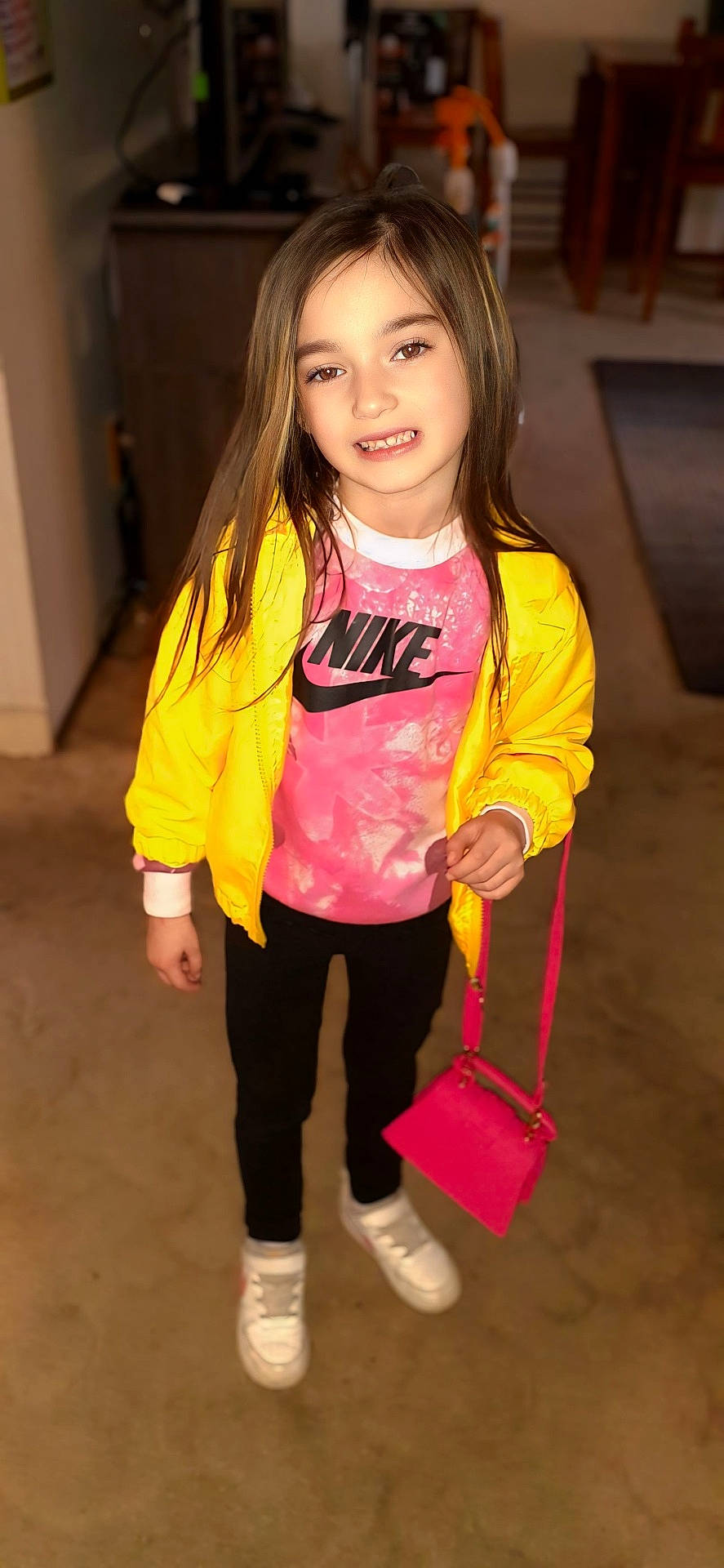 Alivia is registered to the contest to win money with this photo: accessories, bag, bodypart, child, clothing, coat, face, female, finger, footwear, girl, handbag, head, jacket, pants, person, photography, portrait, purse, shoe