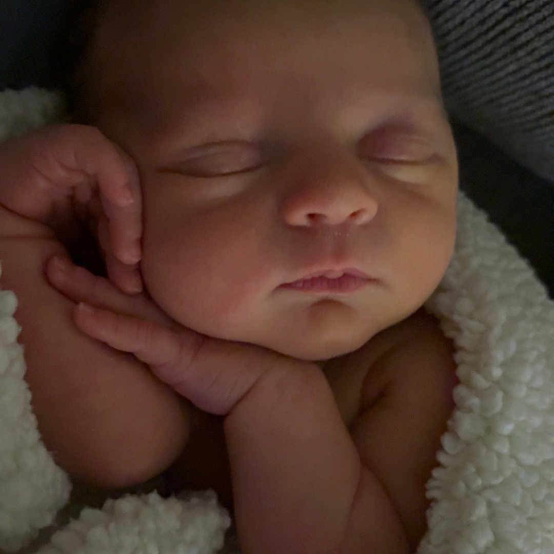 Aurora joined the competition — help win amazing prizes! newborn, baby, sleeping, blanket, infant, peaceful, hands, face, closeup, soft, cozy, wrapped, portrait, child, cute, resting, skin, fingers, warm, relaxation