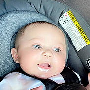 Dontai joined the competition — help win amazing prizes! baby, infant, car_seat, child, drool, happy, face, close_up, seatbelt, straps, white_clothing, cute, skin, head, hand, safety, car, seat, expression, portrait