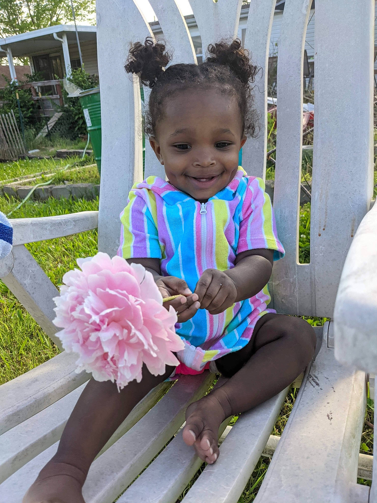 Dominique joined the competition — help win amazing prizes! baby_toddler_clothing, child, cut_flowers, dress, event, flower, flower_arranging, fun, grass, hairstyle, happy, joy, person, petal, pink, plant, public_space, smile, summer, toddler