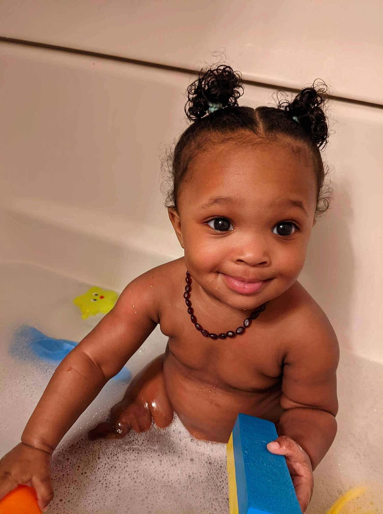 Dominique joined the competition — help win amazing prizes! baby_bathing, bathing, bathtub, child, ear, eye, eyebrow, eyelash, finger, flash_photography, forehead, fun, happy, joy, organ, person, plumbing_fixture, product, skin, smile