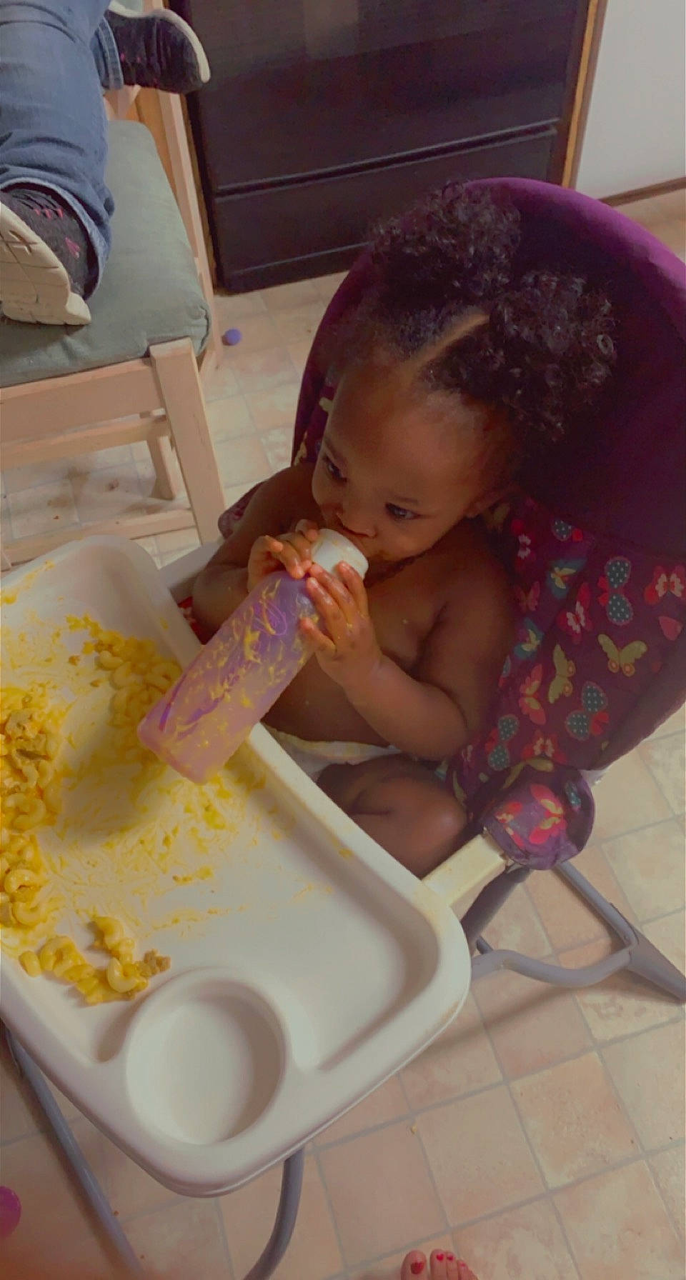 Dominique is registered to the contest to win money with this photo: baby, baby_toddler_clothing, bathing, breakfast, chair, child, comfort_food, cuisine, dish, dishware, flooring, food, fun, ingredient, person, plate, play, recipe, sweetness, tableware
