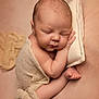 Malo a rejoint le concours — aidez-le/la à gagner de superbes lots ! adorable, baby, beige_background, blanket, closeup, cozy, cute, hand, head, infant, newborn, peaceful, pillow, portrait, skin, sleeping, soft_texture, studio_lighting, swaddle, tiny_toes