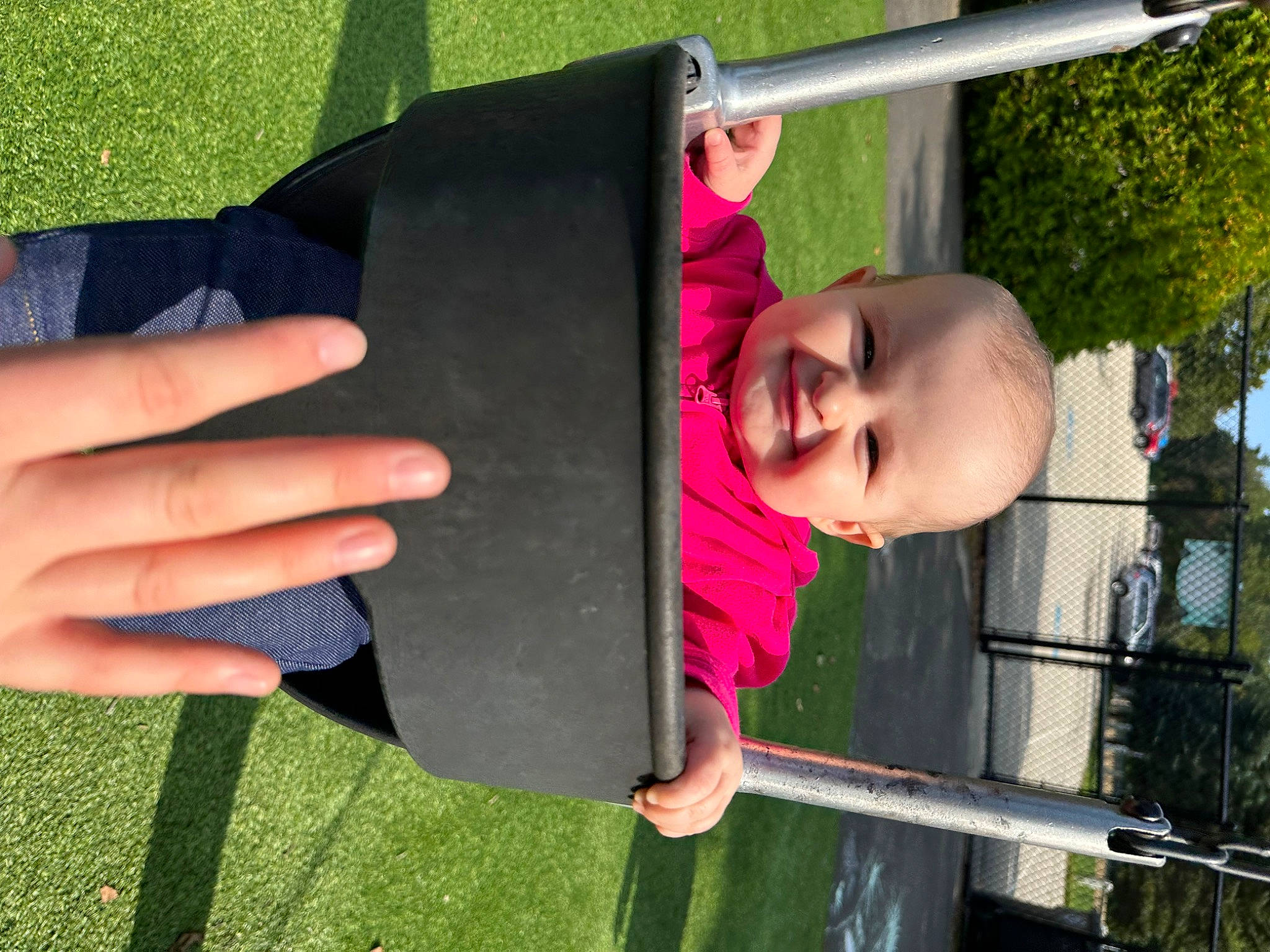 Scarlett joined the competition — help win amazing prizes! baby, baby_toddler_clothing, child, fun, gesture, grass, green, happy, joy, leisure, magenta, outdoor_play_equipment, person, plant, play, recreation, smile, t_shirt, toddler, tree