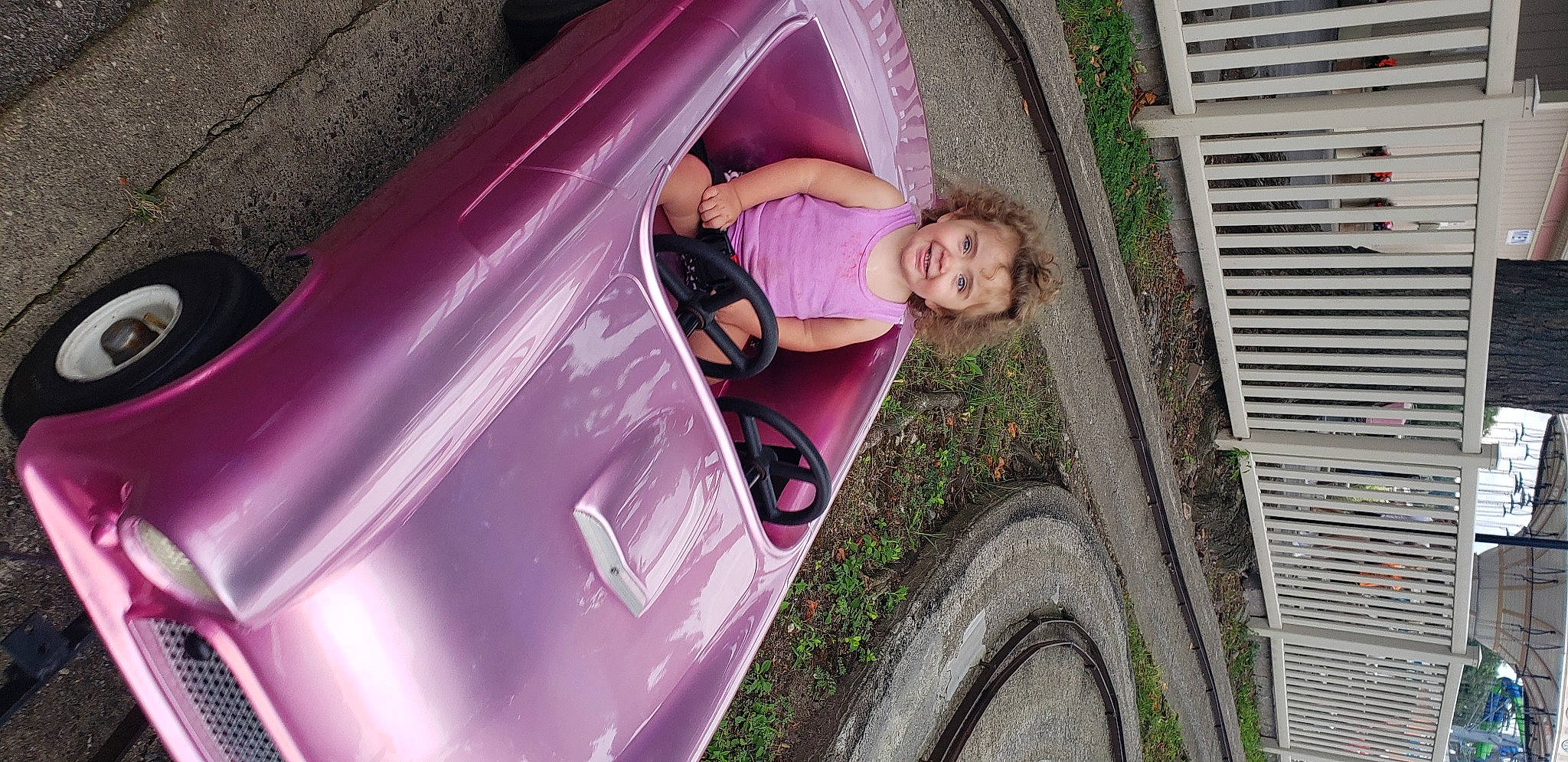 Hailey joined the competition — help win amazing prizes! automotive_design, automotive_exterior, automotive_lighting, automotive_tire, automotive_wheel_system, bumper, car, dress, fender, hood, joy, magenta, motor_vehicle, person, pink, plant, tints_and_shades, tire, vehicle, vehicle_door
