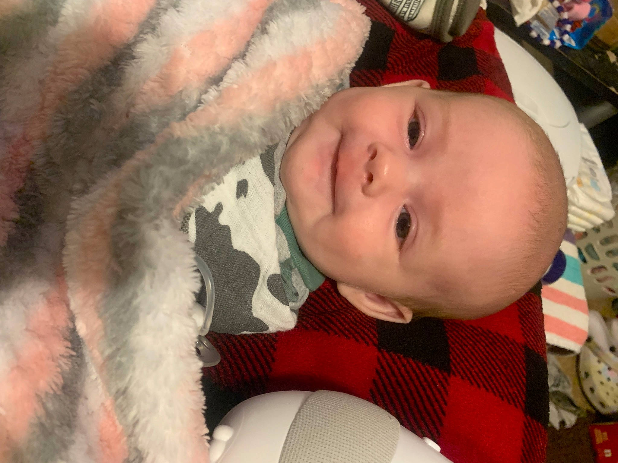 Athena is registered to the contest to win money with this photo: baby, cheek, child, chin, close_up, comfort, eyebrow, eyelash, facial_expression, happy, iris, lip, mouth, nose, person, plant, skin, smile, textile, toddler