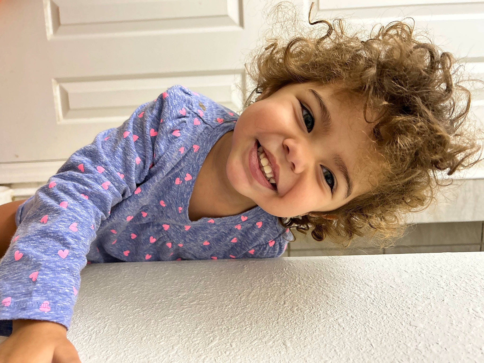 Jenevie is registered to the contest to win money with this photo: baby_toddler_clothing, cheek, chin, eye, face, flash_photography, floor, flooring, hair, happy, head, iris, joy, lip, mouth, nose, person, skin, sleeve, smile