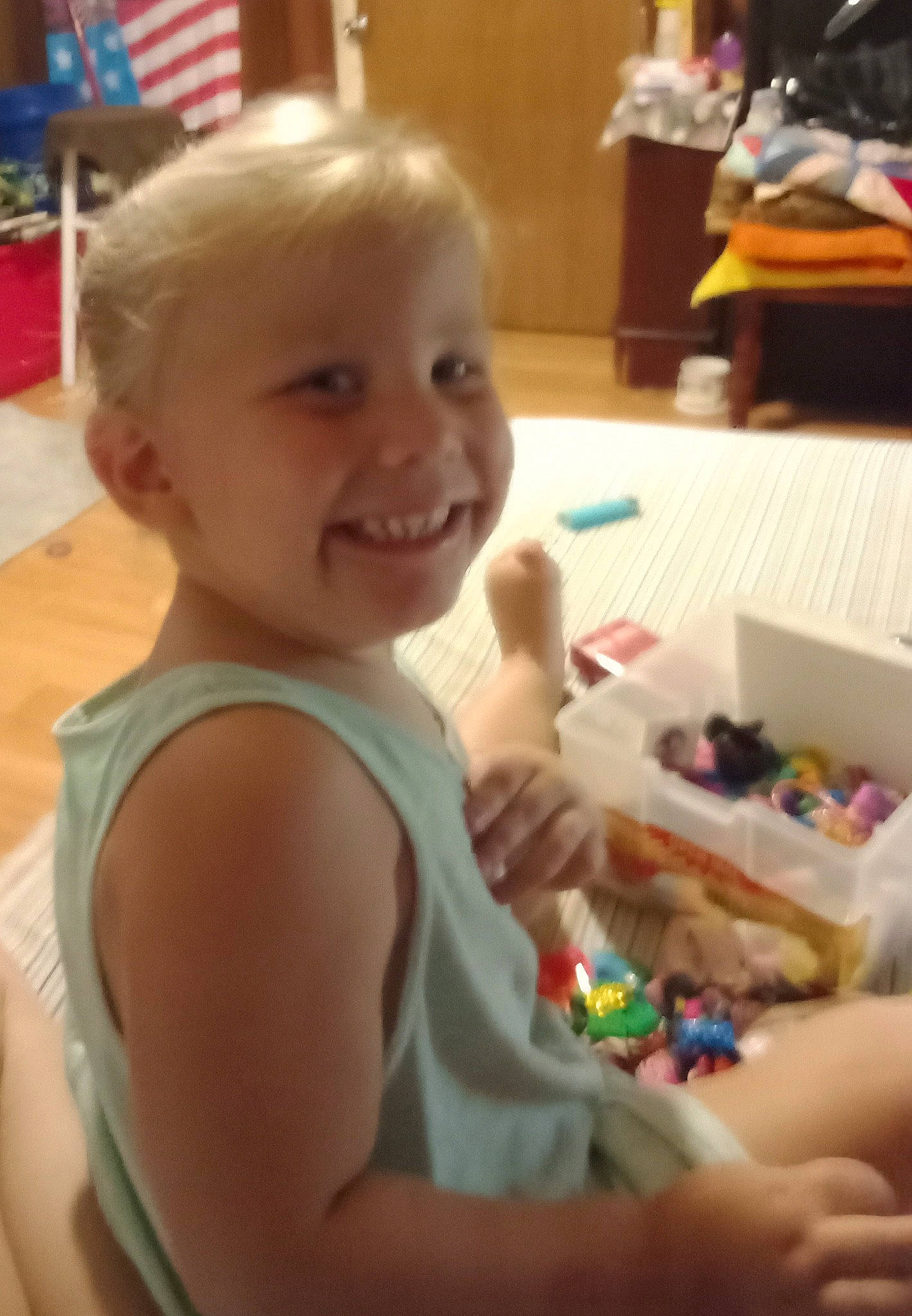 Hannah is registered to the contest to win money with this photo: arm, baby, chair, child, event, finger, flag, flag_of_the_united_states, fun, happy, joy, leisure, organ, party, person, play, room, skin, smile, t_shirt