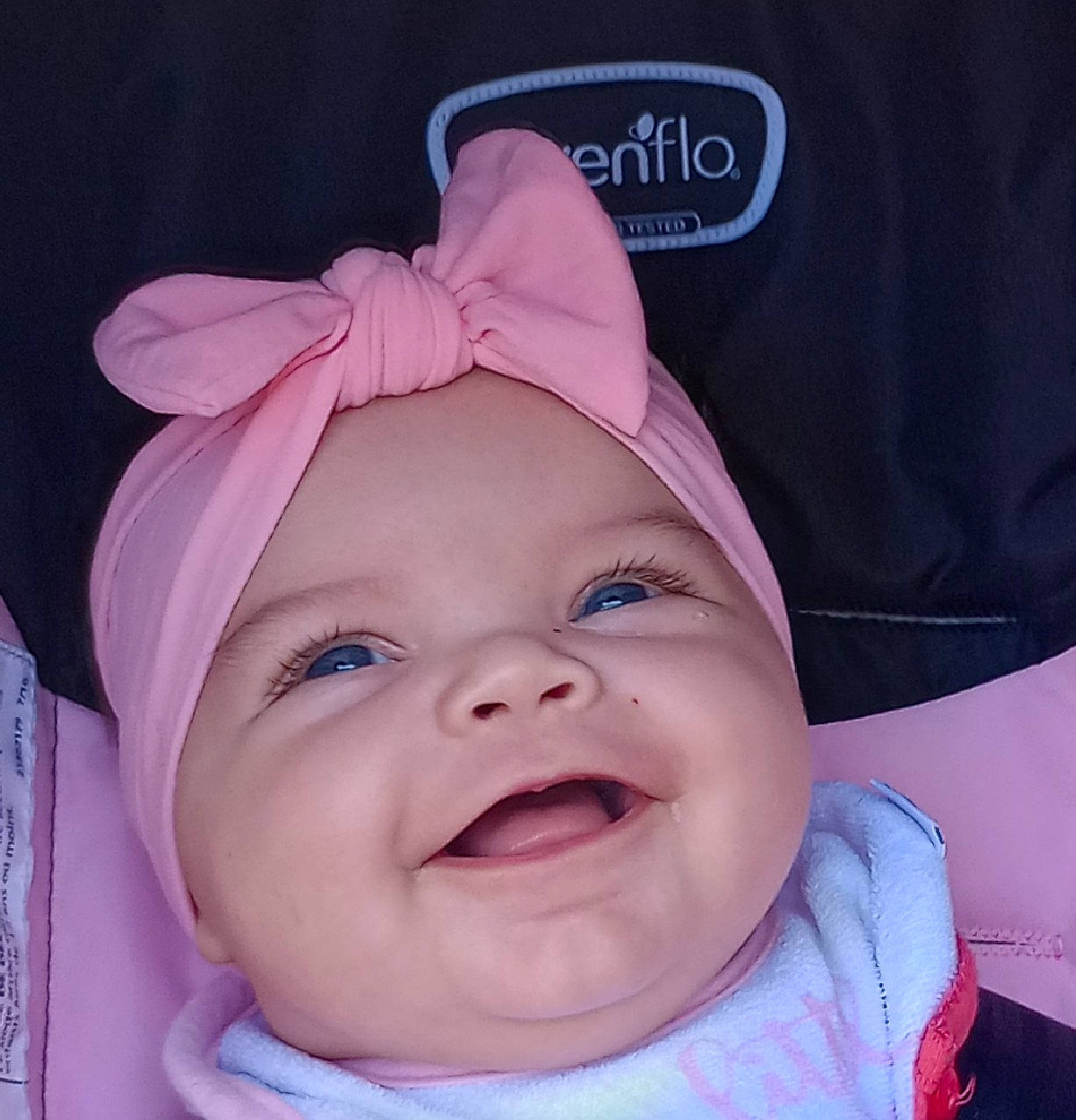 Keira joined the competition — help win amazing prizes! baby, baby_laughing, baby_toddler_clothing, cap, cheek, child, fashion_accessory, hair_accessory, happy, headpiece, headwear, joy, laugh, lip, magenta, person, pink, product, purple, smile