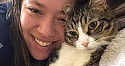 Hercules joined the competition — help win amazing prizes! person, cat, tabby_cat, white_cat, pet, cuddling, smiling, portrait, selfie, face, whiskers, ears, eyes, fur, blanket, couch, indoors, cozy, companion, relaxed