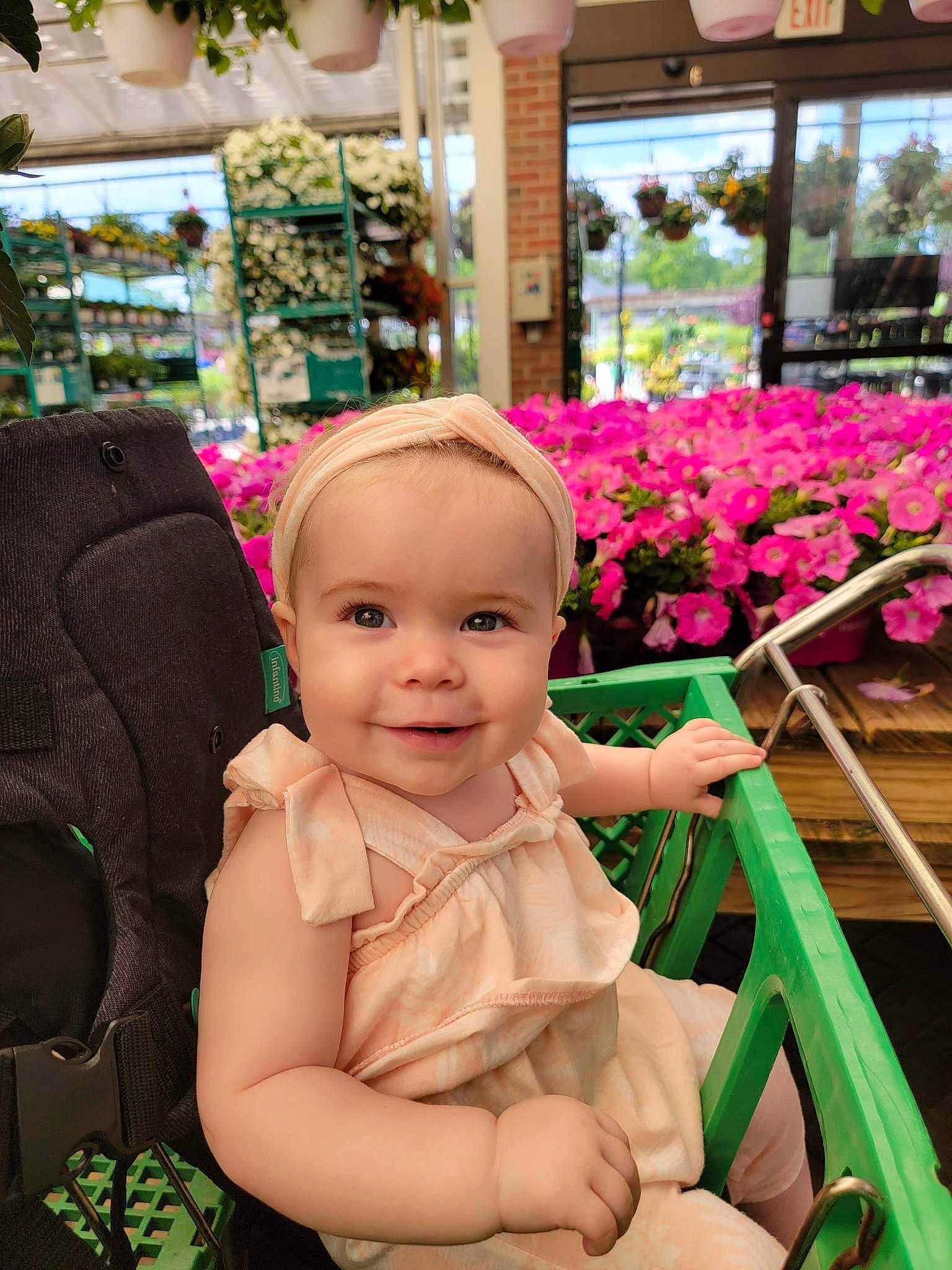 Adelina is registered to the contest to win money with this photo: baby, baby_toddler_clothing, beauty, child, event, flower, fun, grass, green, happy, joy, leisure, magenta, person, petal, photograph, pink, plant, skin, smile