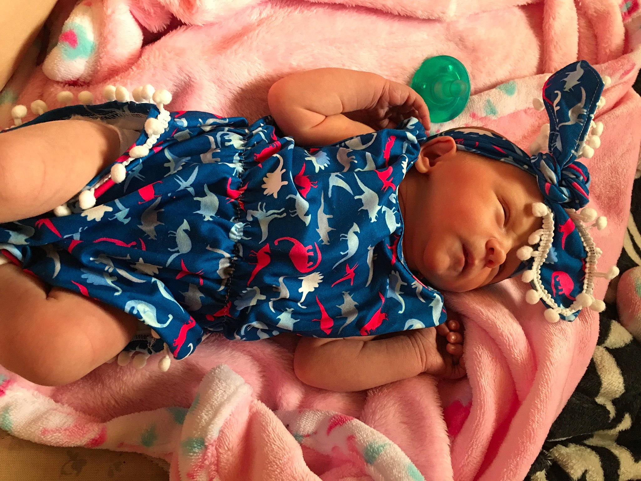 Tayla is registered to the contest to win money with this photo: arm, baby, birth, black_hair, cheek, child, finger, flesh, fun, hand, happy, head, leg, mouth, muscle, neck, person, skin, sleep, thumb