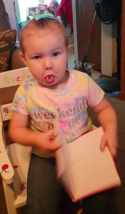 Avery is registered to the contest to win money with this photo: baby, baby_toddler_clothing, box, cheek, child, event, finger, flooring, fun, gadget, hairstyle, head, party, person, sitting, sleeve, standing, t_shirt, tablet_computer, toddler