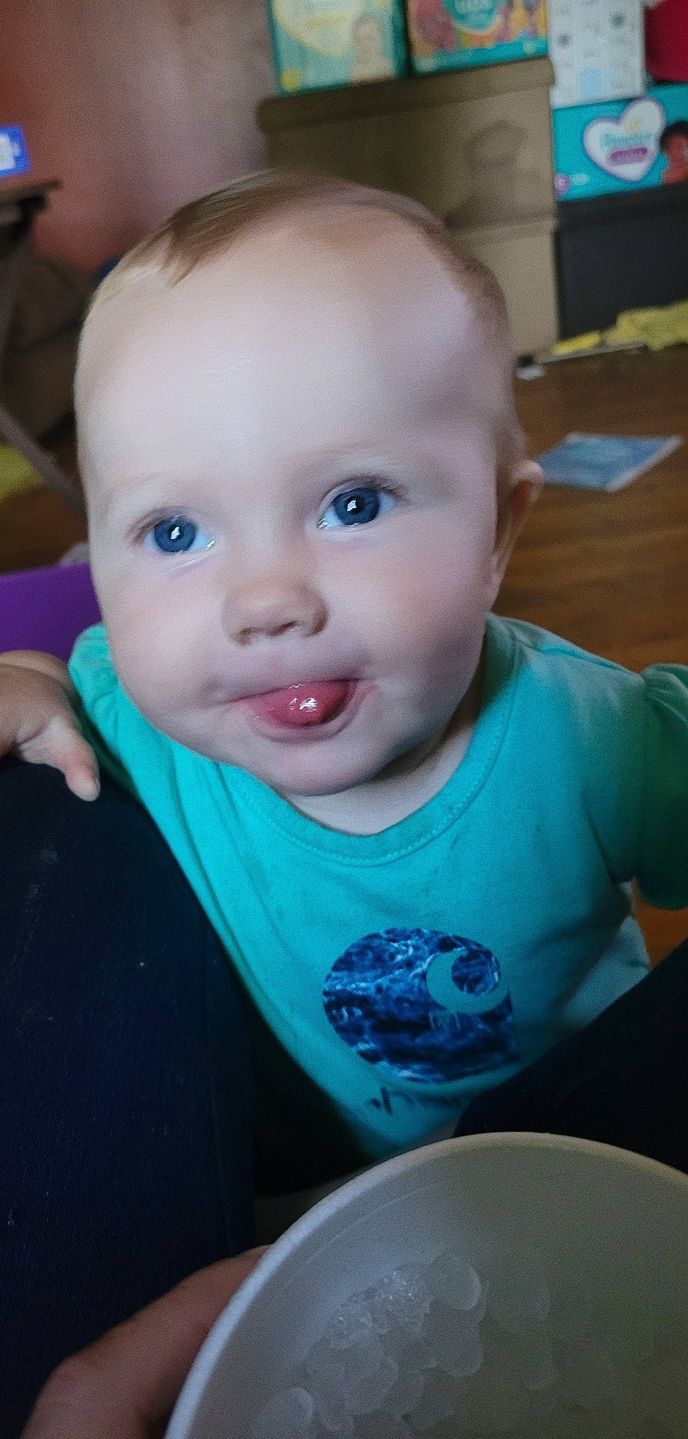 Paisleigh is registered to the contest to win money with this photo: baby, baby_toddler_clothing, cheek, child, cool, ear, electric_blue, eyelash, finger, happy, iris, lip, mouth, nose, person, sitting, skin, sleeve, smile, t_shirt