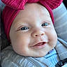 Mckinley joined the competition — help win amazing prizes! baby, infant, smile, headband, pink, car_seat, closeup, cute, child, happy, face, apparel, clothing, seatbelt, blanket, portrait, person, cute_expression, indoors, baby_accessory