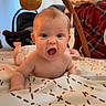 Mckinley joined the competition — help win amazing prizes! baby, infant, blanket, toy, baby_gym, expression, indoor, child, playtime, face, cute, pattern, soft_toy, car_seat, home, person, newborn, happy, skin, toddler