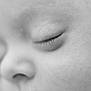baby, face, close_up, sleeping, black_and_white, skin, eyelashes, peaceful, infant, newborn, soft, portrait, child, nose, cheek, calm, monochrome, quiet, tender, macro