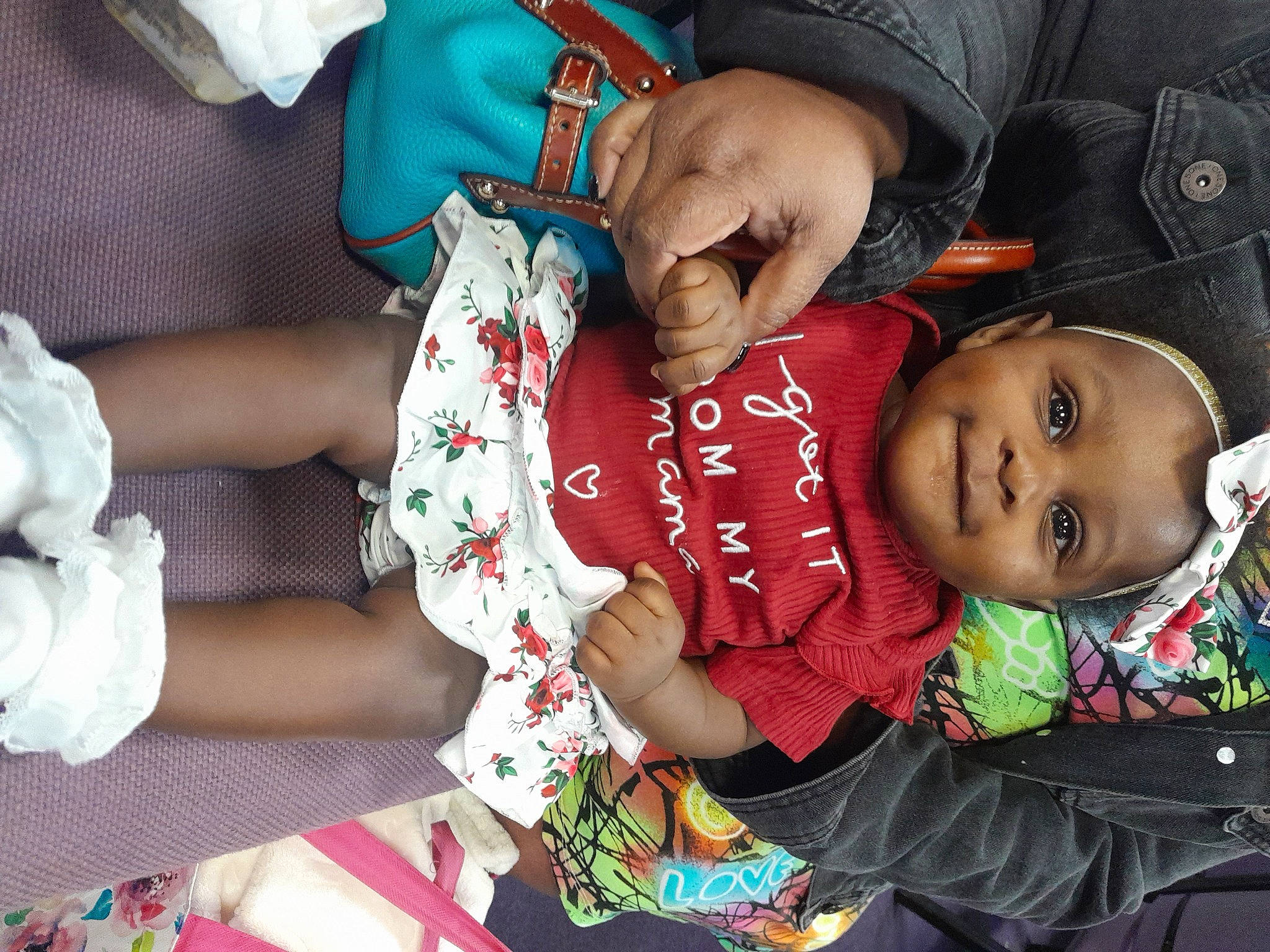 Miracle is registered to the contest to win money with this photo: baby, baby_products, baby_toddler_clothing, cheek, child, comfort, fun, happy, lap, linens, pattern, person, play, product, sharing, sitting, sleeve, smile, toddler