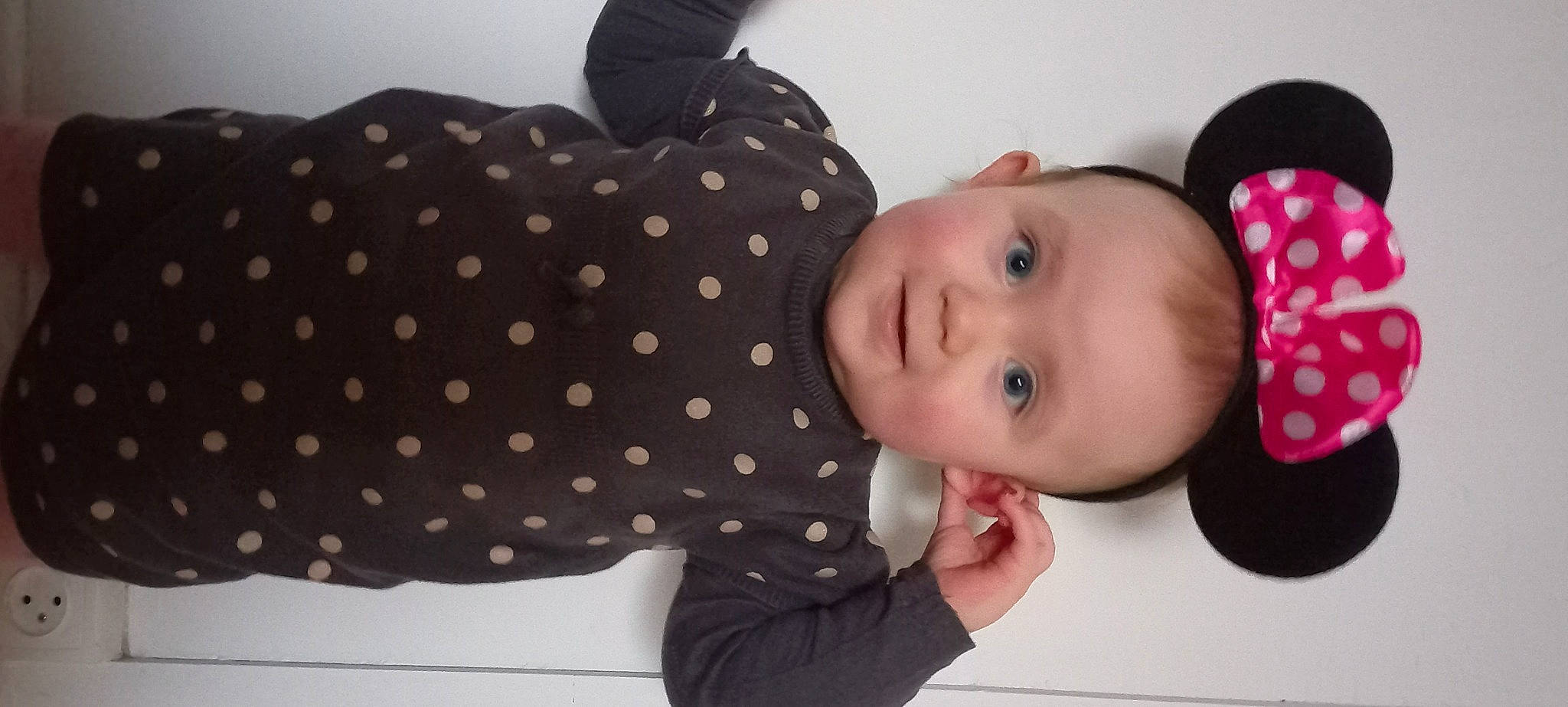 Lena participe au concours pour gagner de l'argent avec cette photo : baby, baby_products, baby_toddler_clothing, beauty, cheek, child, comfort, eyelash, happy, headgear, mammal, outerwear, pattern, person, pink, product, skin, sleeve, textile, toddler
