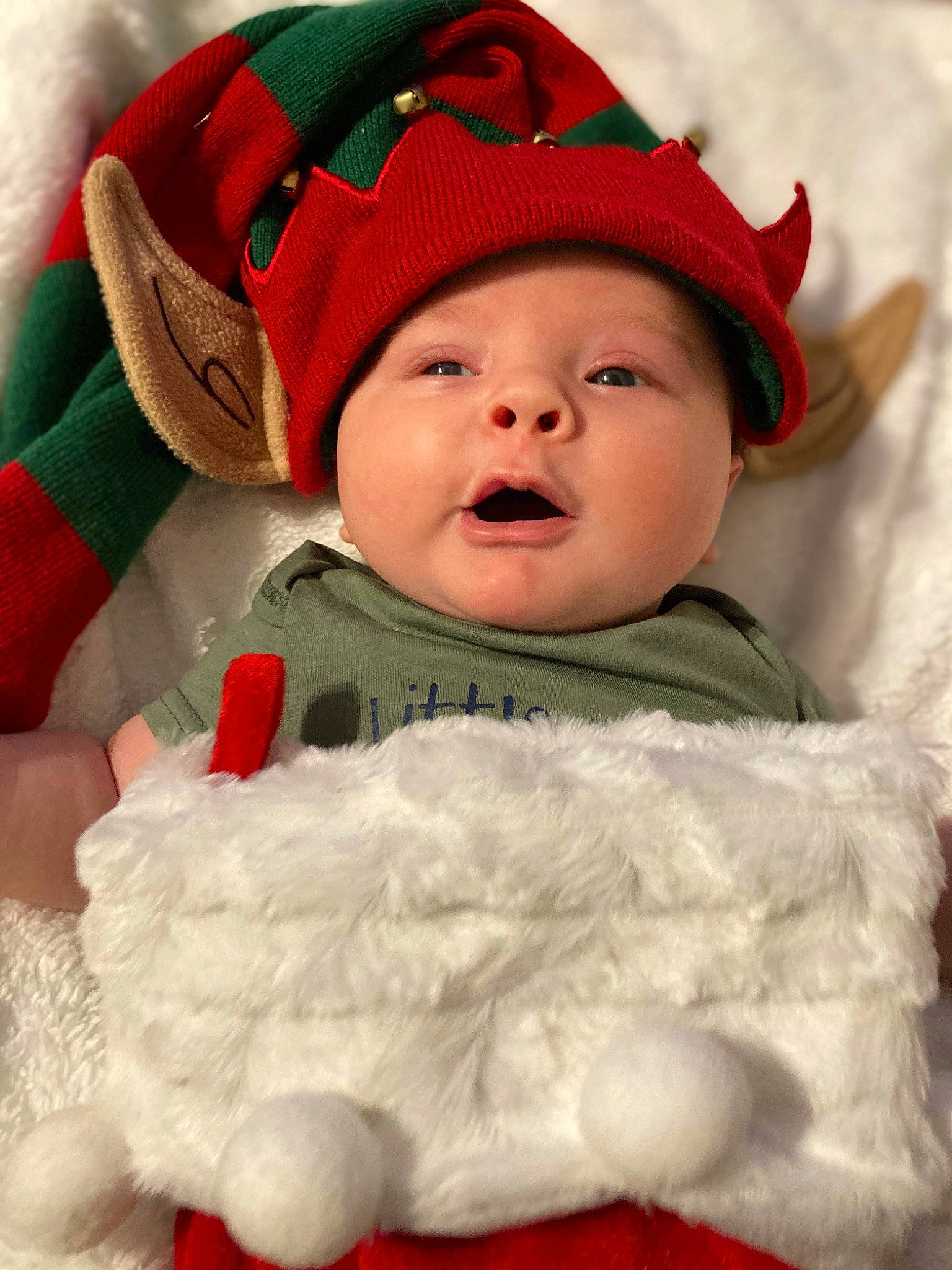 Kyle is registered to the contest to win money with this photo: baby, baby_toddler_clothing, cap, cheek, child, comfort, face, fun, happy, hat, head, headgear, headwear, lip, mouth, organ, person, red, skin, textile