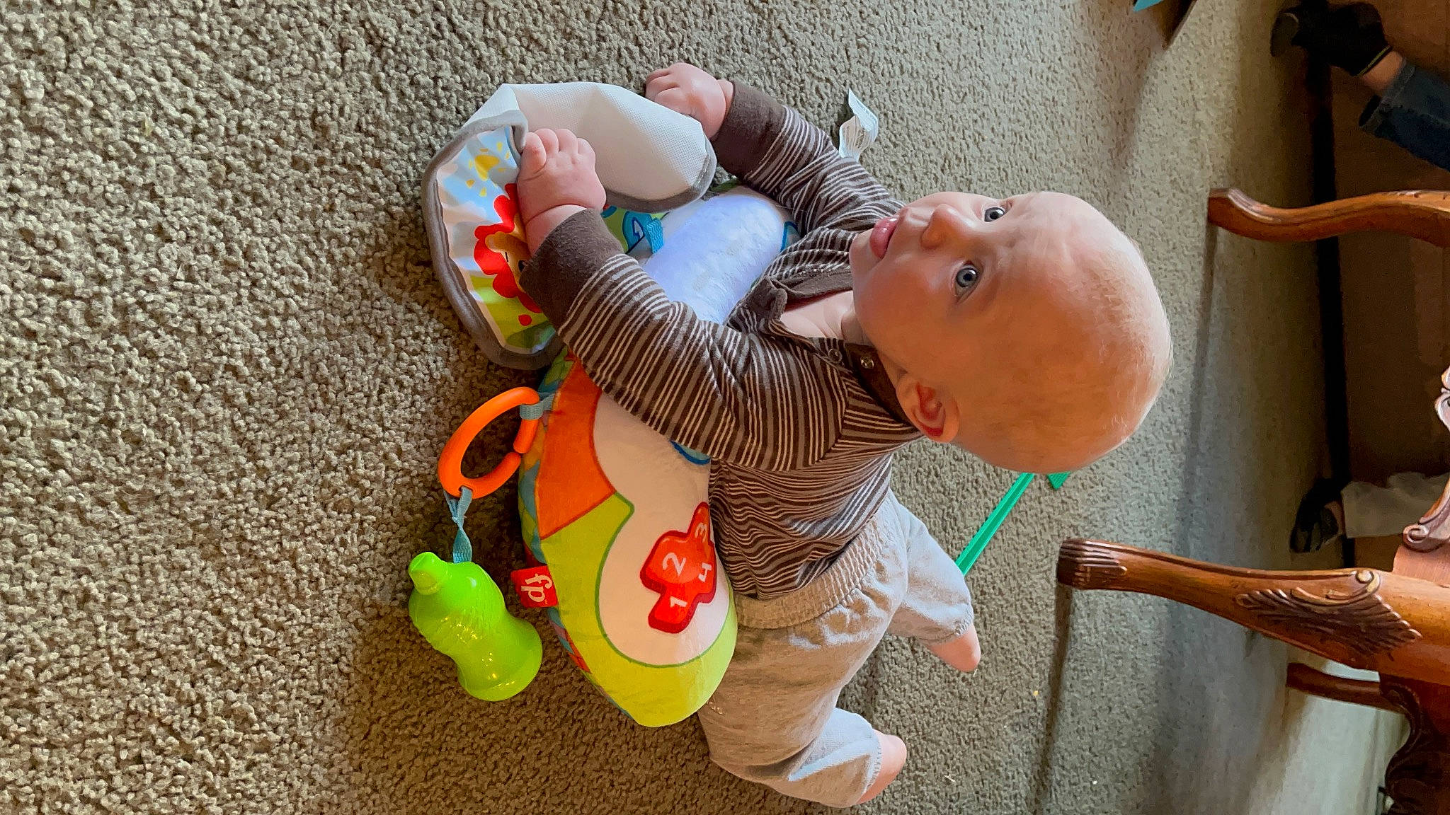 James joined the competition — help win amazing prizes! baby, baby_products, baby_safety, baby_toddler_clothing, baby_toys, child, comfort, finger, foot, fun, happy, orange, person, play, plush, room, sitting, stuffed_toy, toddler, toy