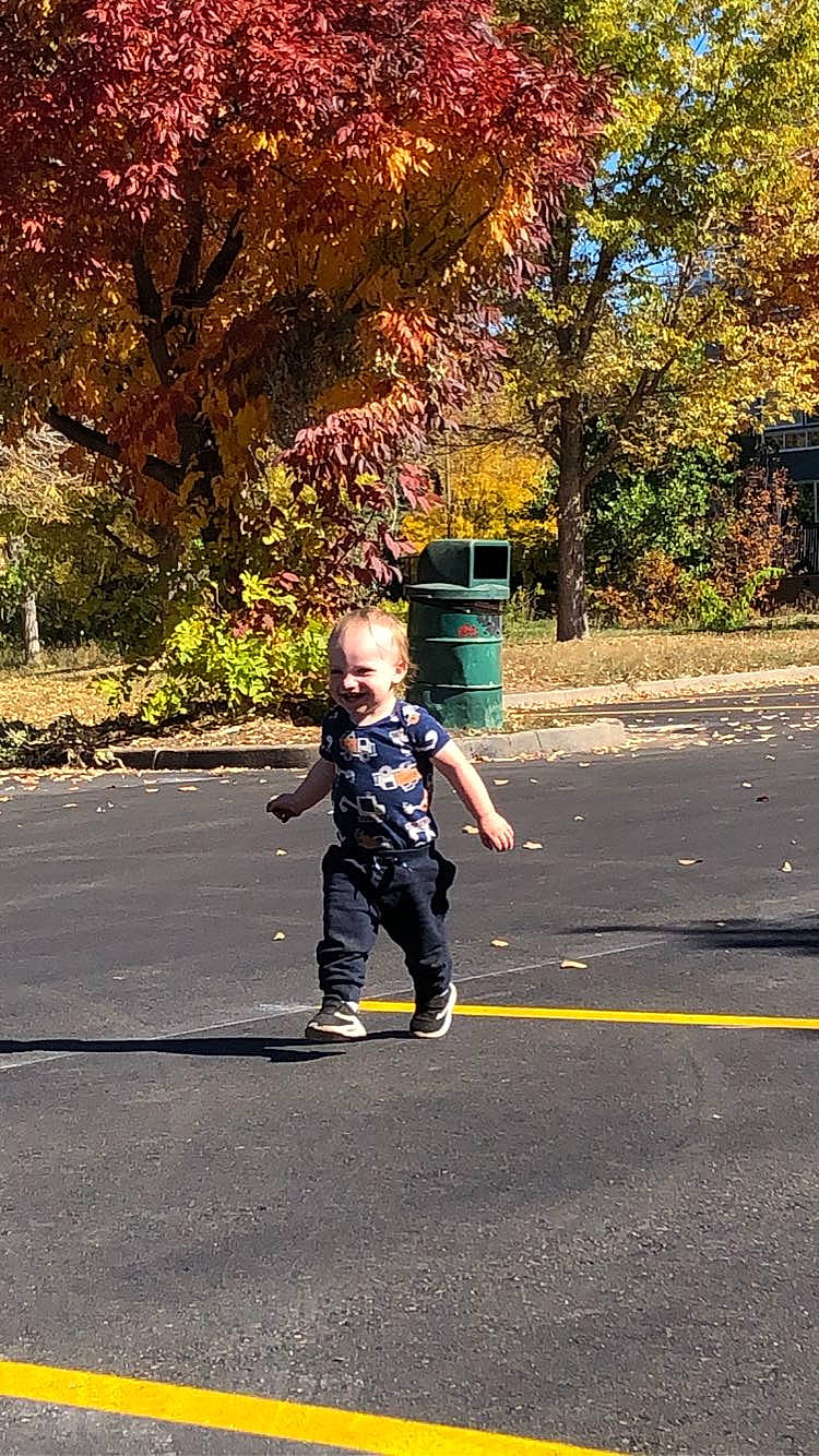 Easton joined the competition — help win amazing prizes! asphalt, deciduous, electric_blue, grass, happy, joy, landscape, leisure, pedestrian, people_in_nature, person, plant, recreation, road, road_surface, running, sidewalk, sunlight, tints_and_shades, toddler