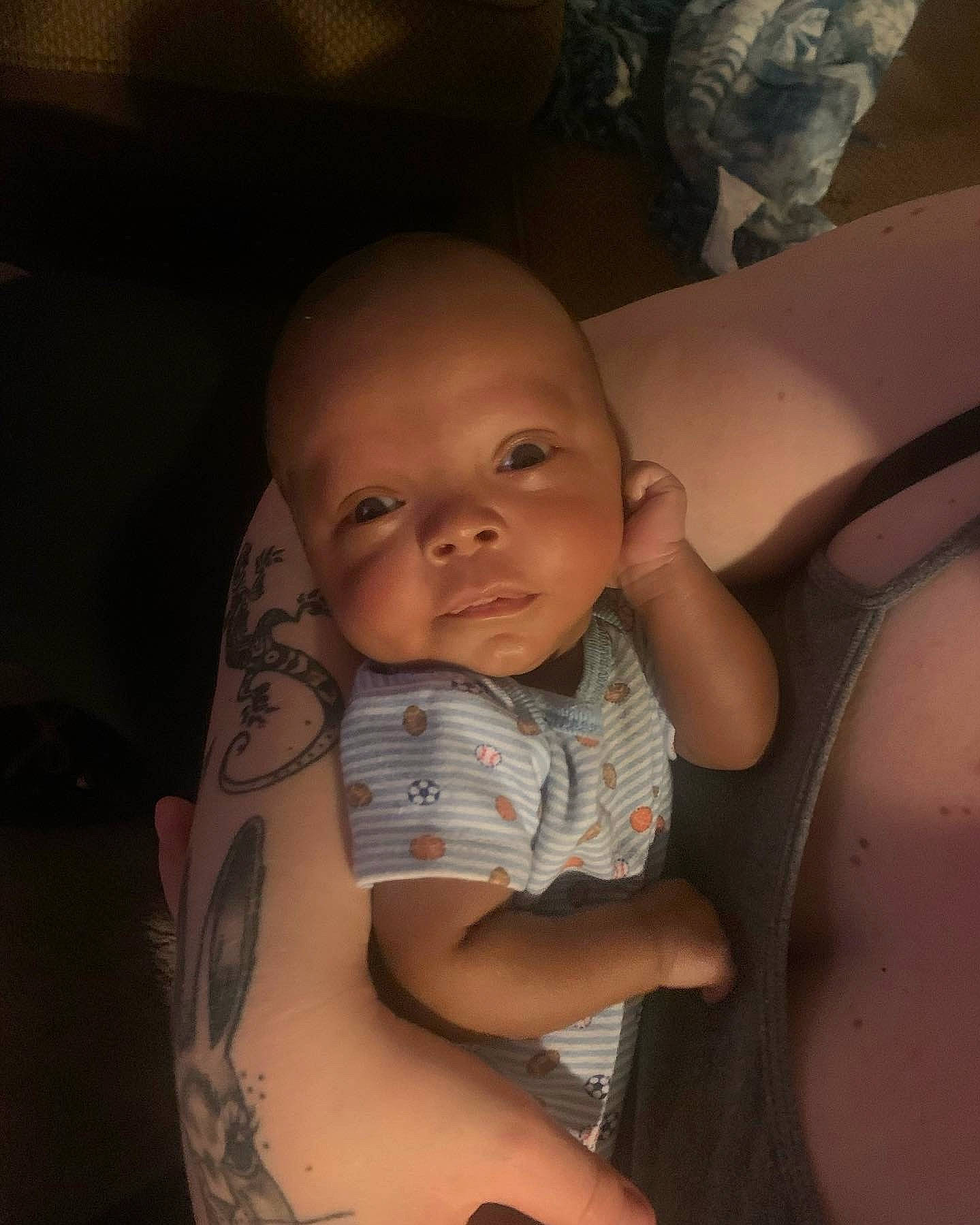 Keshawn is registered to the contest to win money with this photo: baby, cheek, chest, chin, comfort, eye, eyebrow, flash_photography, fun, happy, head, human_body, iris, leg, mouth, nose, person, skin, smile, thigh