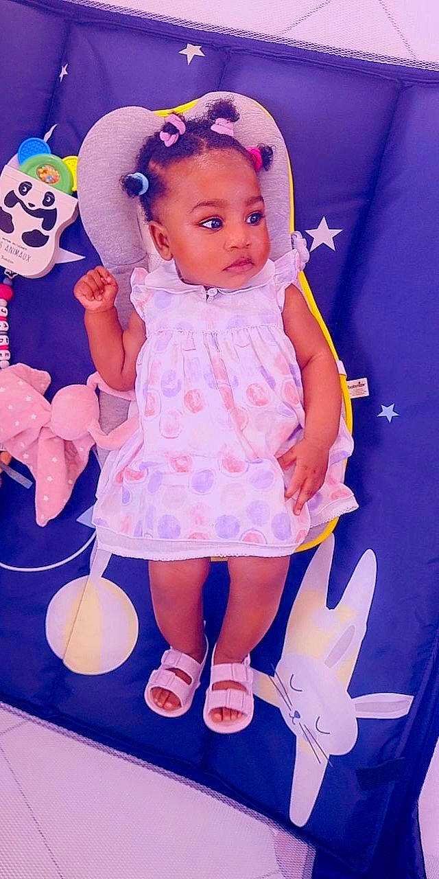 Jade participe au concours pour gagner de l'argent avec cette photo : baby_toddler_clothing, blue, child, doll, dress, electric_blue, fashion_design, hairstyle, happy, head, magenta, pattern, person, pink, product, purple, skin, toy, violet, white