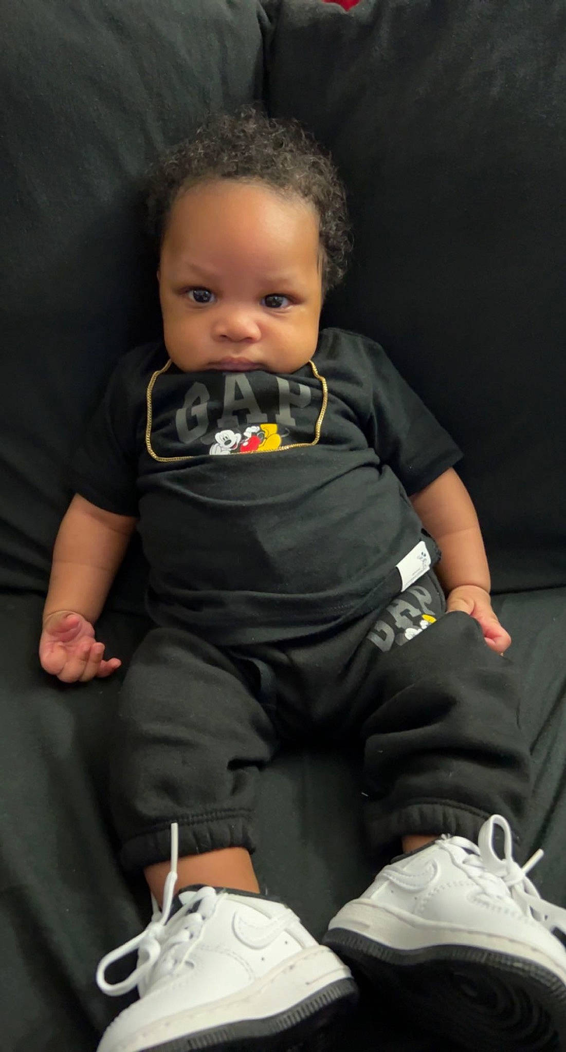 Kyng joined the competition — help win amazing prizes! baby, baby_carriage, baby_toddler_clothing, black, chair, cheek, child, comfort, face, finger, fun, hand, head, human_body, knee, person, personal_protective_equipment, product, sleeve, toddler