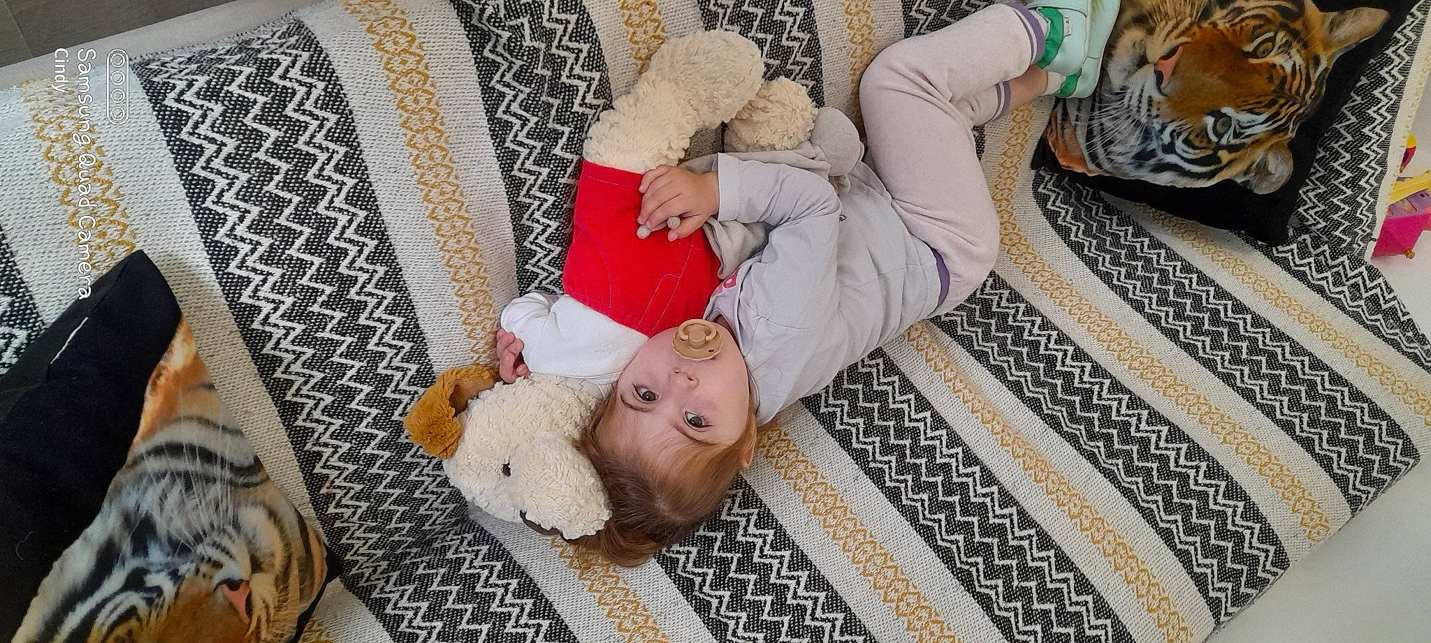 Mya participe au concours pour gagner de l'argent avec cette photo : baby_sleeping, bed_sheet, bedding, bedtime, carpet, child, comfort, floor, flooring, fur, hardwood, leisure, linens, nap, pattern, person, room, sitting, sleep, toddler