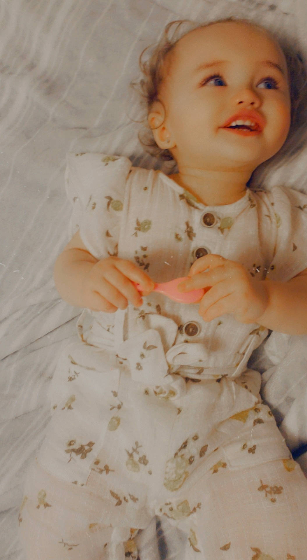 Teaghan joined the competition — help win amazing prizes! arm, baby, baby_toddler_clothing, cheek, comfort, dress, embellishment, face, finger, flooring, hairstyle, hand, happy, lip, person, pink, skin, sleeve, smile, toddler