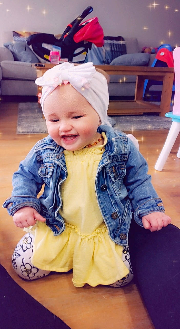 Teaghan is registered to the contest to win money with this photo: baby, baby_toddler_clothing, blue, cap, child, electric_blue, fashion_accessory, fun, fur, happy, headwear, joy, leisure, person, pink, purple, recreation, sitting, skin, sleeve