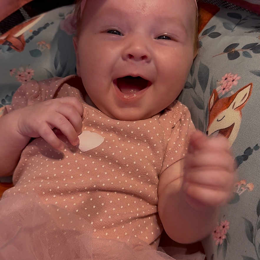 Willow joined the competition — help win amazing prizes! baby, babylaughing, bodypart, bonnet, clothing, cream, dessert, dress, face, finger, food, hand, happy, hat, head, icing, newborn, person, photography, portrait