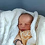 Emilio Kalavassis participe au concours pour gagner de l'argent avec cette photo : baby, blanket, child, clothing, comfort, cozy, cute, face, head, indoors, infant, newborn, peaceful, portrait, resting, sleeping, soft, toddler, warm, wrapped