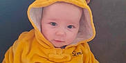 Emilio Kalavassis participe au concours pour gagner de l'argent avec cette photo : animal_ears, baby, calm, child, childcare, couch, cozy, curious, cute, face, hood, indoor, infant, nursery, pillow, portrait, seated, soft_toys, warm_clothing, yellow_onesie