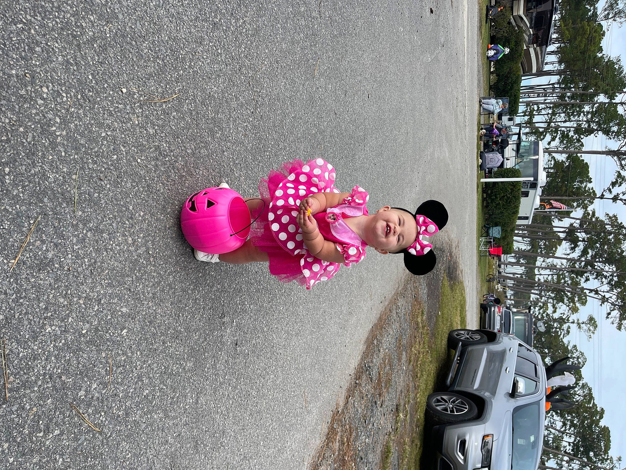 Blakely joined the competition — help win amazing prizes! asphalt, automotive_design, automotive_exterior, automotive_lighting, car, joy, leisure, motor_vehicle, person, pink, plant, road_surface, sidewalk, tire, toddler, toy, tree, vehicle, vehicle_door, wall