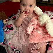 Journei joined the competition — help win amazing prizes! baby, child, pink_dress, plush_toy, bunny, blanket, minnie_mouse, indoor, soft_toys, footwear, sock, face, hand, sitting, curious, cute, infant, cozy, comfort, furniture