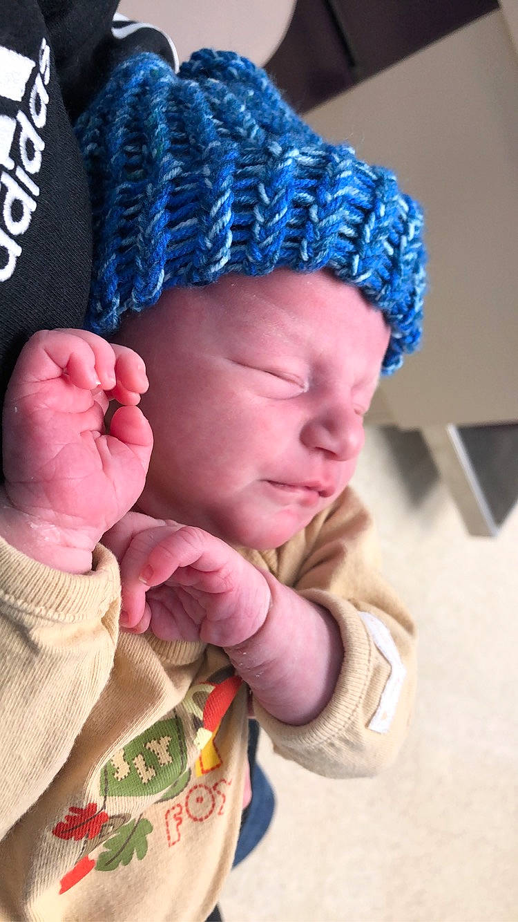 Jared is registered to the contest to win money with this photo: baby, baby_toddler_clothing, beanie, cap, child, cool, craft, electric_blue, fashion_accessory, finger, fur, gesture, headwear, knit_cap, magenta, nail, pattern, person, thumb, toddler