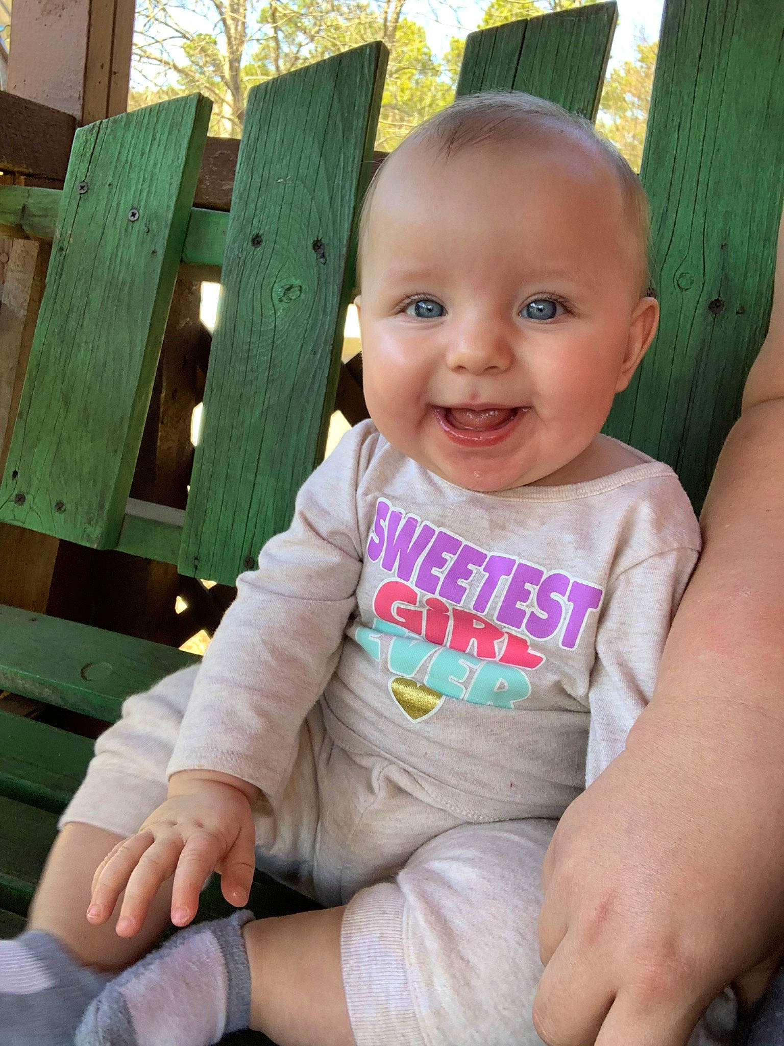 Kinzley is registered to the contest to win money with this photo: baby, baby_toddler_clothing, cheek, child, face, finger, hand, happy, joy, person, sitting, skin, smile, thumb, toddler