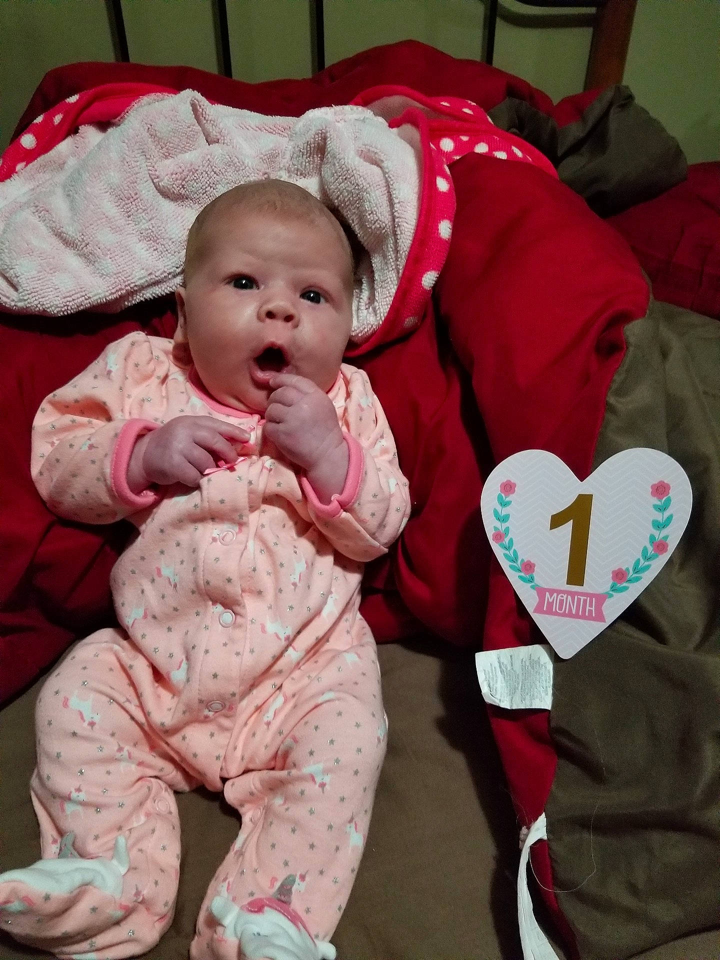 Alexandria is registered to the contest to win money with this photo: baby_products, child, girl, infant, person, pink, product, red, skin, smile, textile, toddler