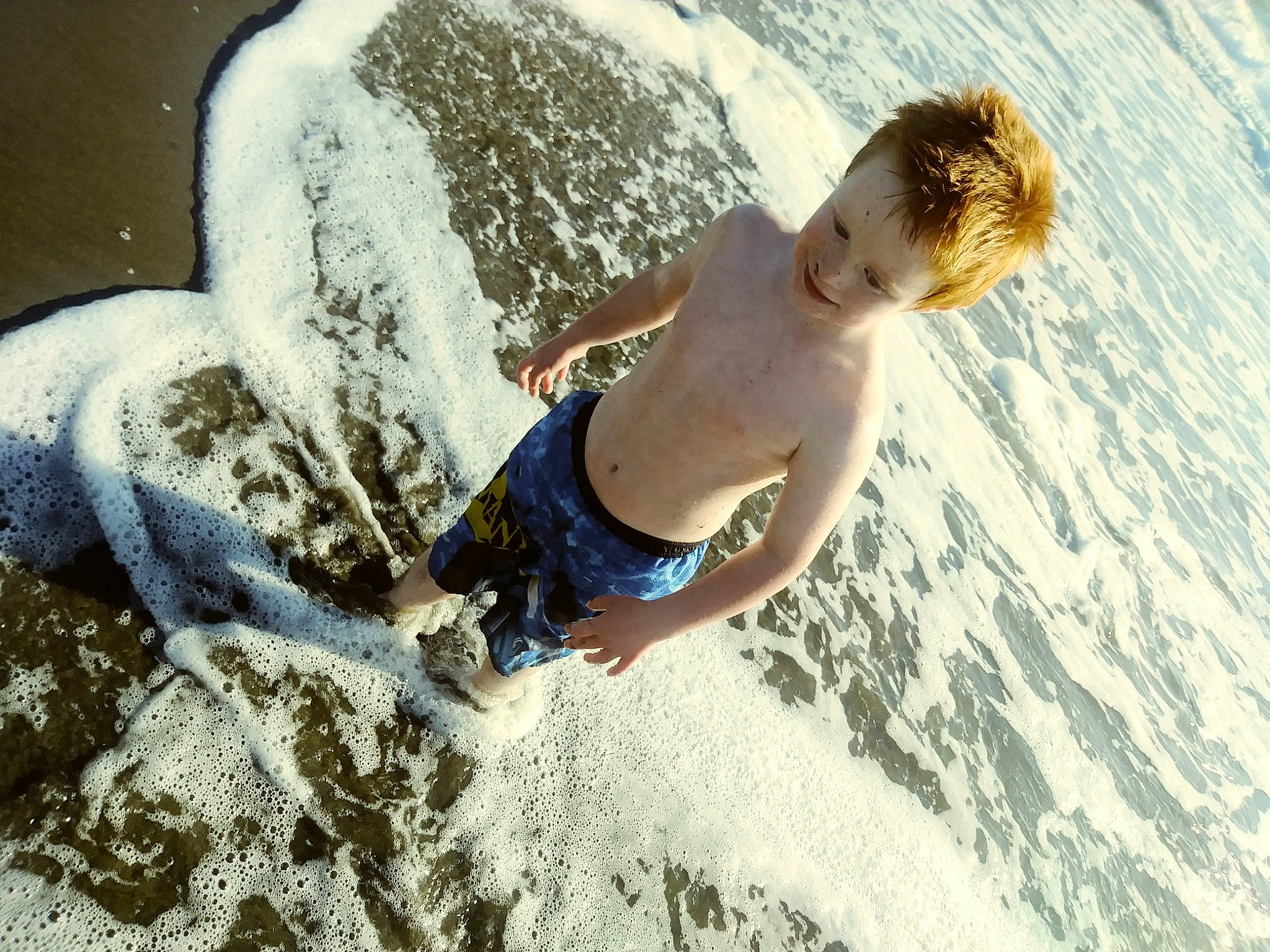 Zaiden is registered to the contest to win money with this photo: beach, child, fun, happy, leisure, male, person, photography, play, recreation, sand, sea, summer, vacation, water, wave