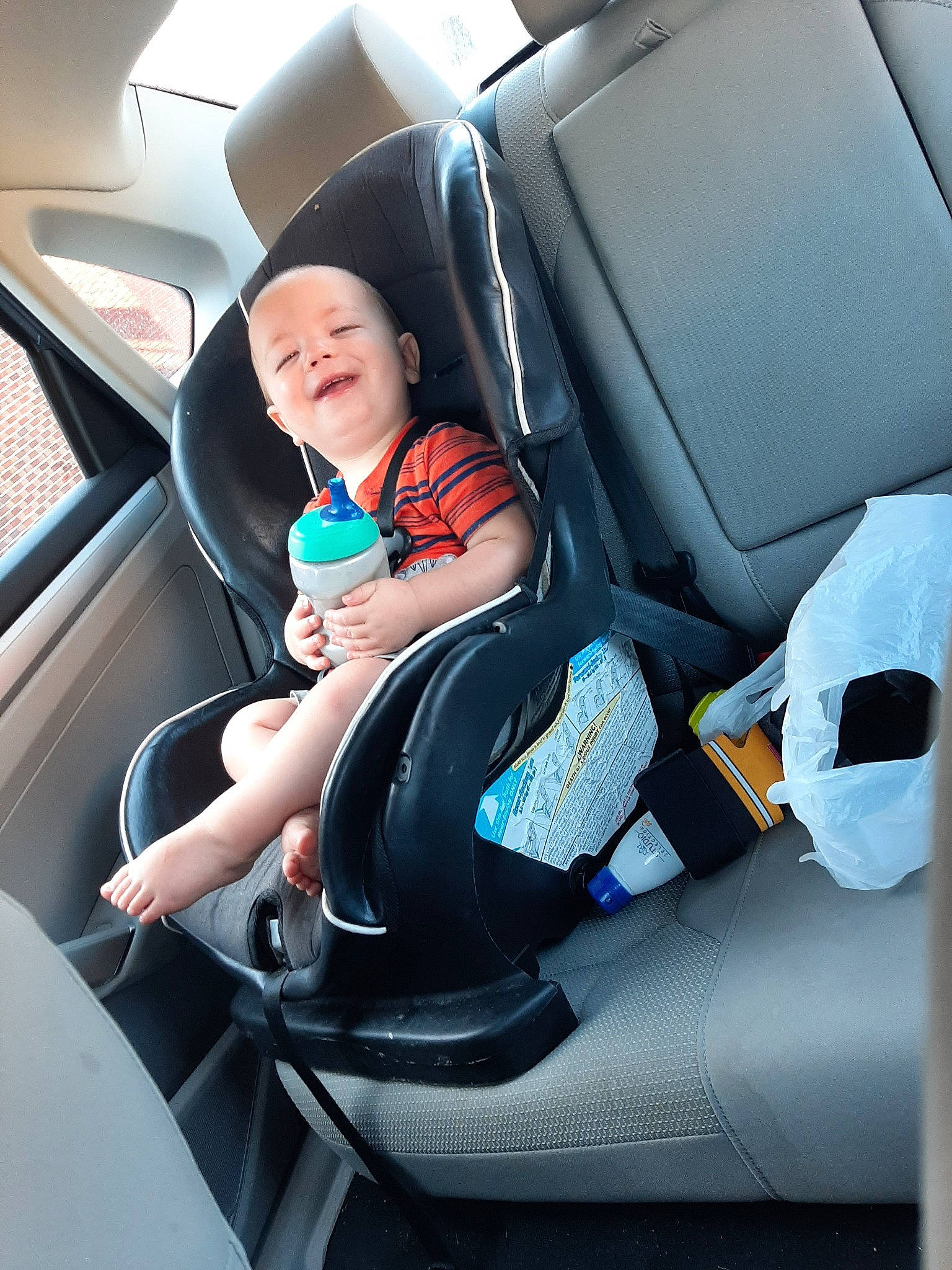 Jaydin is registered to the contest to win money with this photo: auto_part, baby_in_car_seat, car, car_seat, car_seat_cover, child, driving, family_car, head_restraint, motor_vehicle, person, seat_belt, toddler, vacation, vehicle, vehicle_door