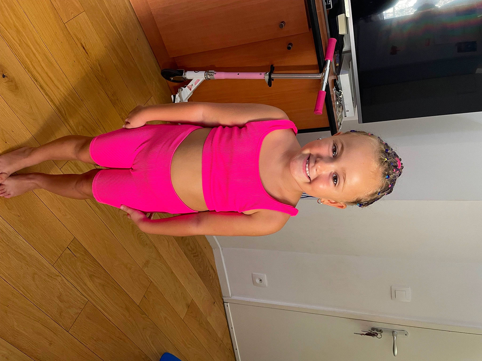 Nicole Anelis participe au concours pour gagner de l'argent avec cette photo : abdomen, chest, cocktail_dress, elbow, fun, hardwood, hip, human_leg, joy, knee, magenta, pattern, person, pink, room, smile, thigh, throat, trunk, waist