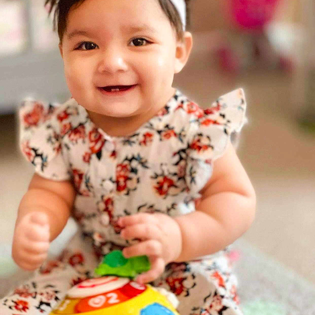 Aria joined the competition — help win amazing prizes! baby, baby_playing_with_toys, baby_toddler_clothing, child, hair_accessory, joy, person, play, smile, toddler