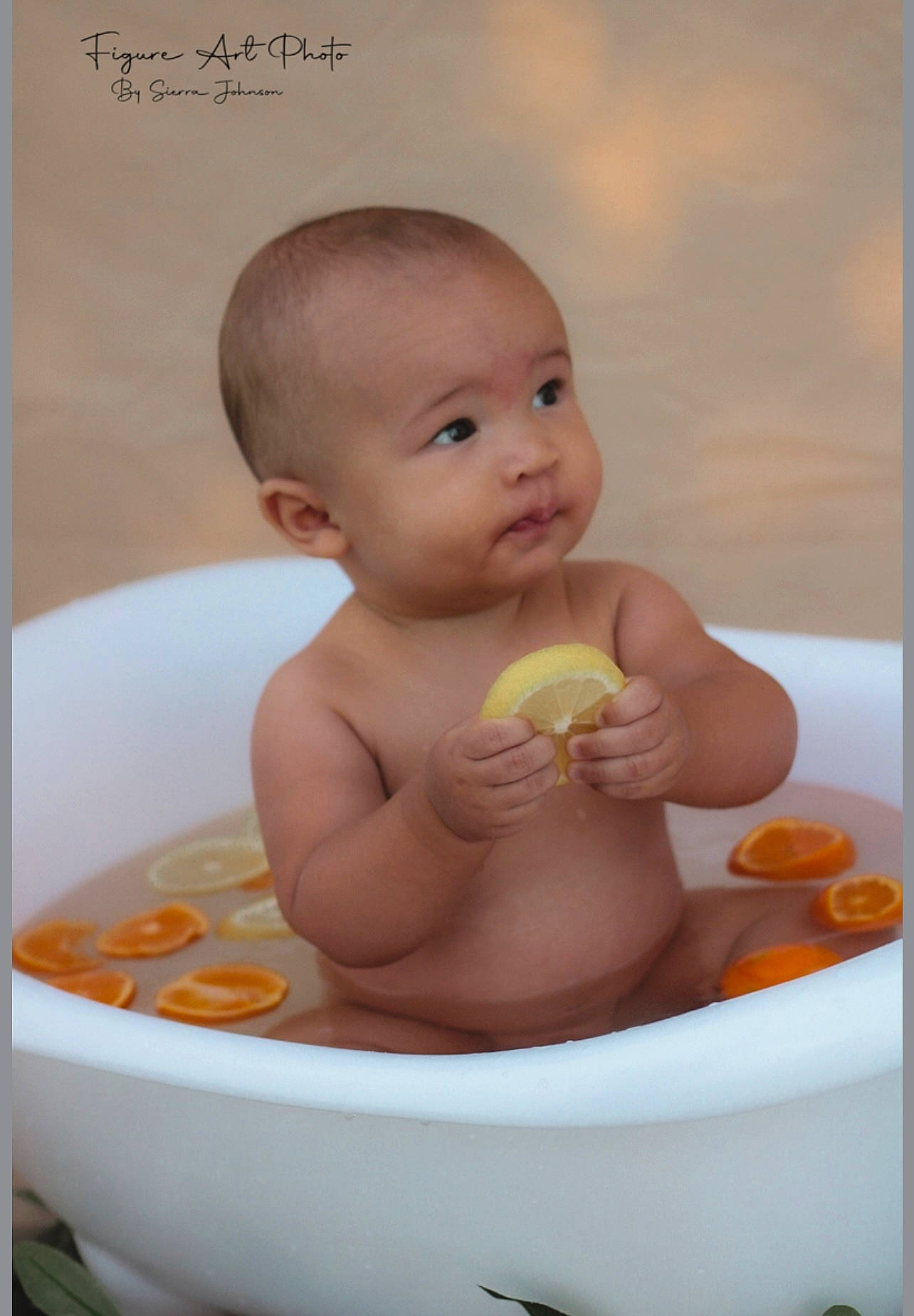 Sebastian is registered to the contest to win money with this photo: art, baby, baby_bathing, baby_products, bath_toy, bathing, bathtub, cheek, chest, child, eye, fluid, fun, happy, person, product, sitting, skin, stomach, toddler