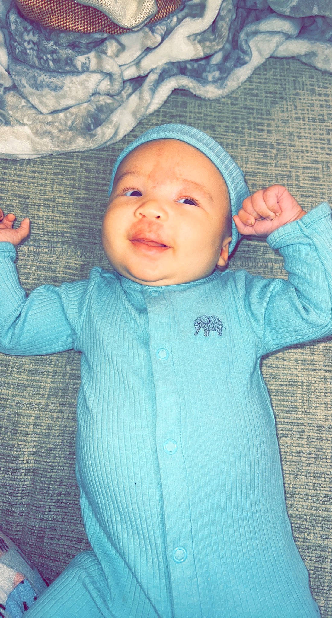 Sebastian joined the competition — help win amazing prizes! azure, baby, baby_toddler_clothing, cheek, eye, facial_expression, gesture, happy, head, headwear, human_body, mouth, nose, organ, outerwear, person, pink, skin, sleeve, smile