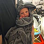 Vincent joined the competition — help win amazing prizes! adult, baby, blanket, bonnet, cap, clothing, face, fleece, hat, head, hood, hoodie, laundry, male, man, newborn, person, photography, portrait, towel