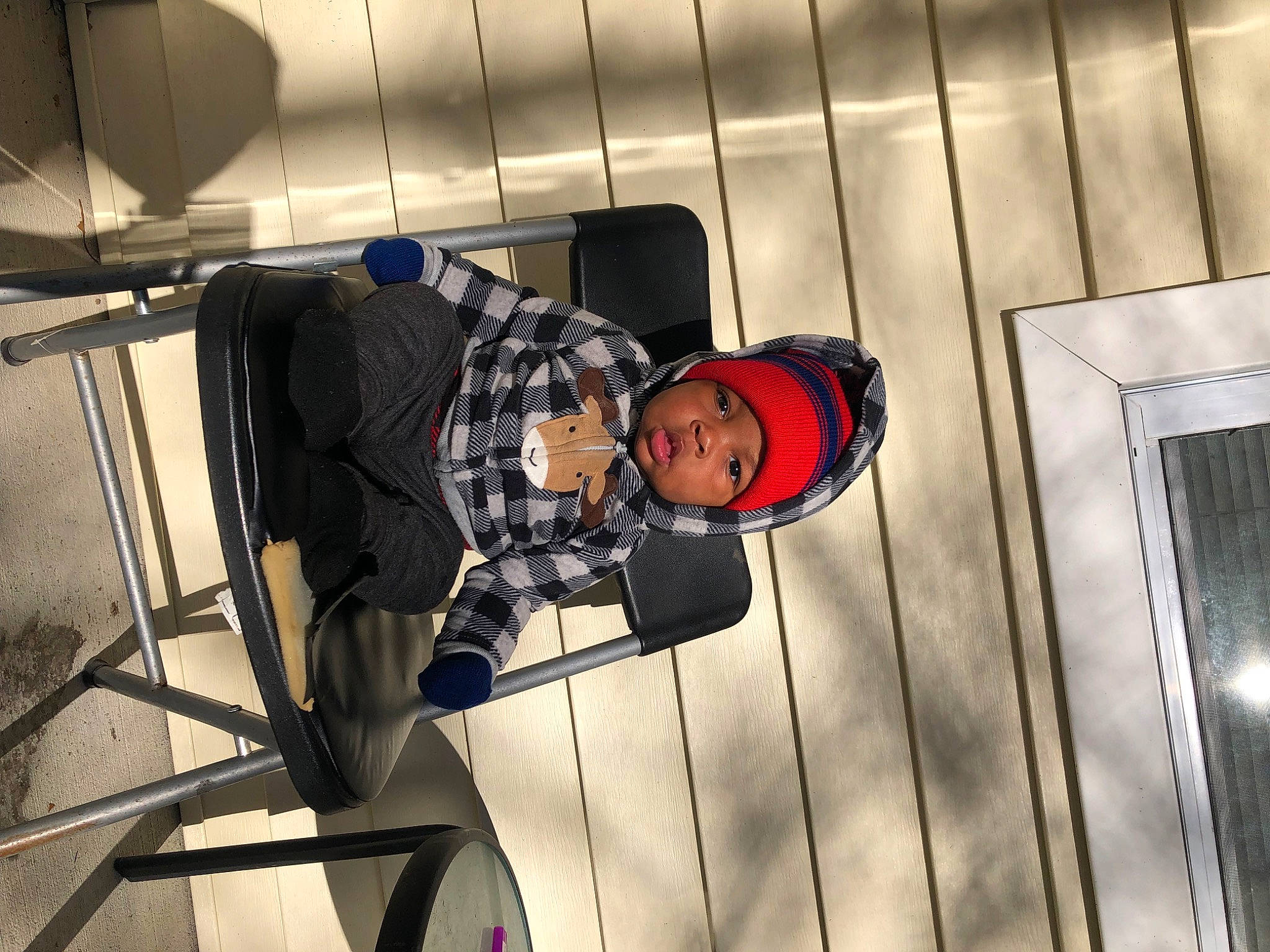 King is registered to the contest to win money with this photo: fun, hat, headwear, music, person, toddler