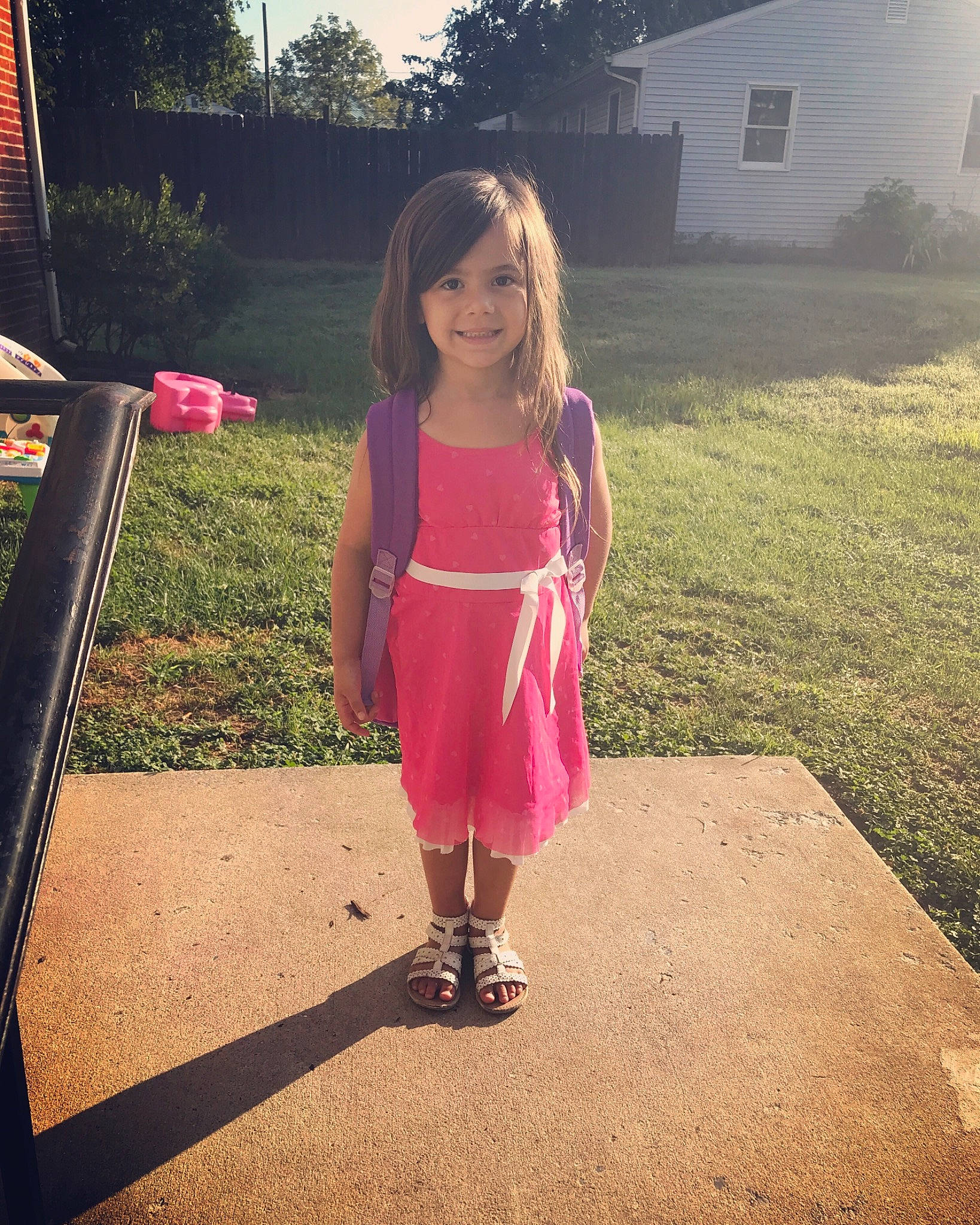 Payton joined the competition — help win amazing prizes! child, dress, footwear, fun, grass, joy, leg, long_hair, morning, person, photography, pink, plant, play, recreation, shoe, smile, summer, sunlight, toddler