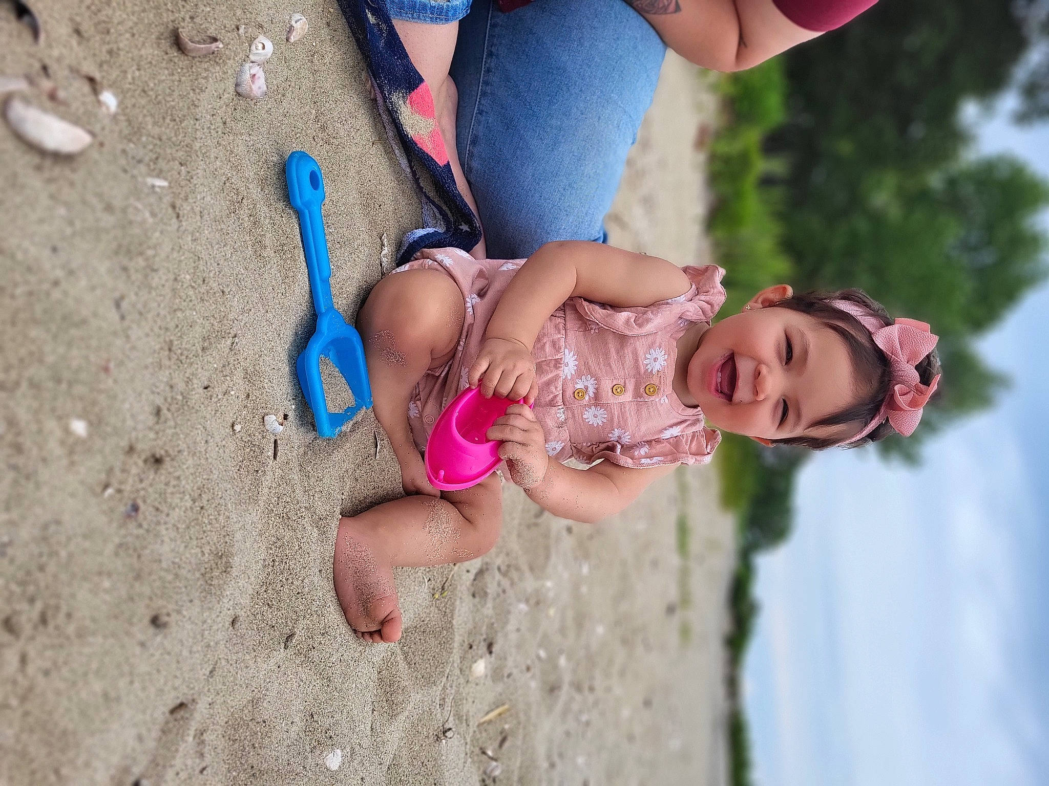 Alanna joined the competition — help win amazing prizes! baby, barefoot, beach, blue, child, electric_blue, foot, fun, grass, happy, human_leg, leisure, people_in_nature, person, pink, recreation, skin, sky, thigh, toddler
